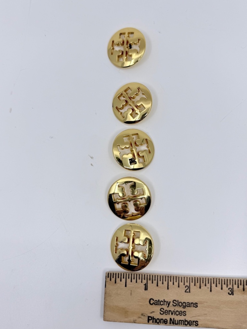 Five Gold Finish Tory Burch Buttons